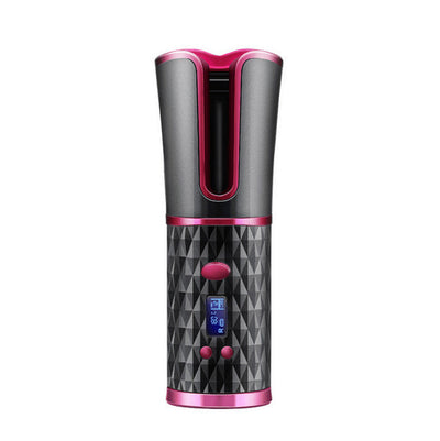 Cordless automatic hair curler iron with rechargeable battery and digital display in black and pink design