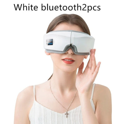 Woman wearing a white rechargeable eye protector with Bluetooth and LCD screen during eye massage therapy