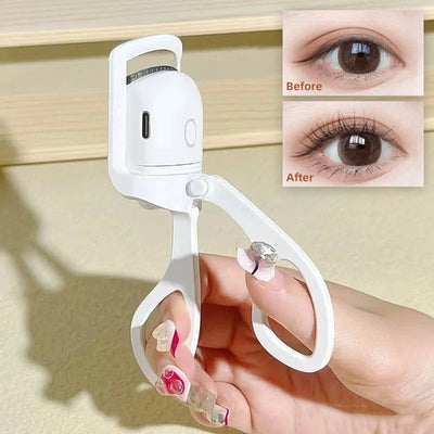 White portable rechargeable heated eyelash curler with before and after lash curl results shown