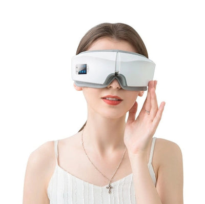 Woman wearing a rechargeable eye protector massager with Bluetooth and LCD display