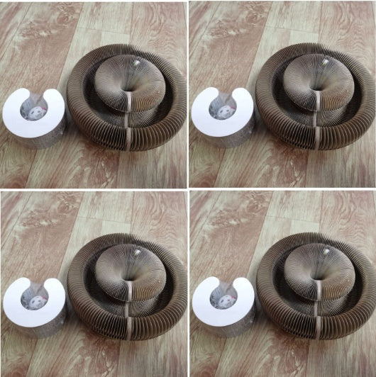 Corrugated and foldable cat paper nest toy with round layered design on wooden floor