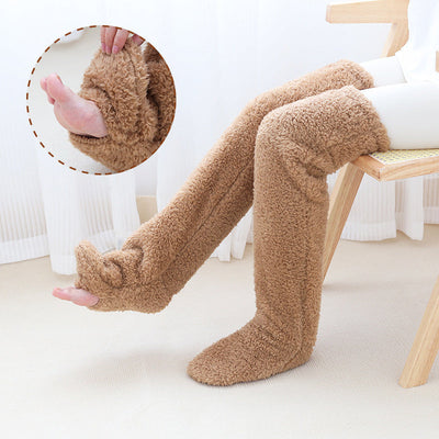 Over knee high fuzzy socks in brown, cozy and warm for winter, displayed worn.