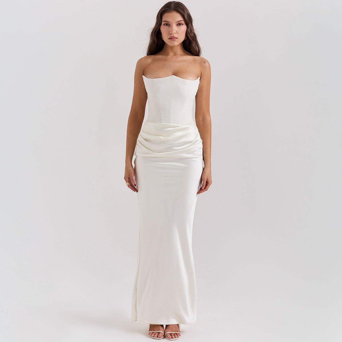woman wearing white slim tube top long backless evening dress sexy style