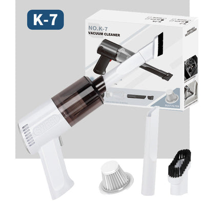 Dual purpose vacuum cleaner for wet and dry use in small cars, includes accessories like brush head and USB charging cable.