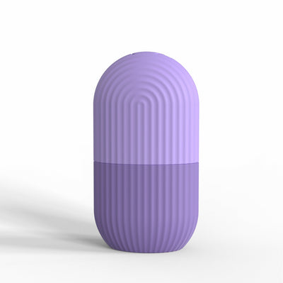 Purple silicone ice cube tray mold for facial massage and beauty care.