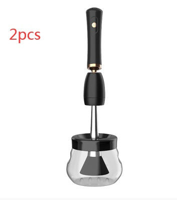 Makeup brush cleaning machine electric scrubber with black handle and transparent bowl.