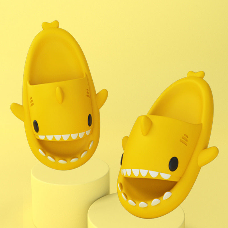 Yellow adult's slippers with funny shark cartoon design, indoor and outdoor casual footwear, made of soft EVA material.