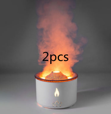 Ultrasonic essential oil humidifier with volcano flame simulation releasing mist in white cylindrical design
