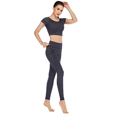 Woman wearing dark gray pocket yoga clothes suit in size S M L XL made of versatile Lycra fabric