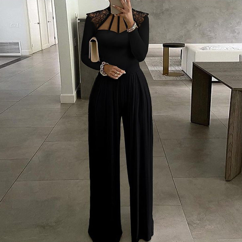 Women’s black long sleeve wide leg jumpsuit in milk silk fabric with stitching details and lace shoulders