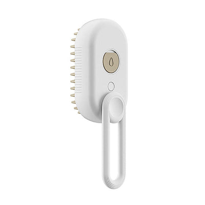 White 3-in-1 electric pet hair brush with steam spray and soft silicone bristles for grooming cats and dogs