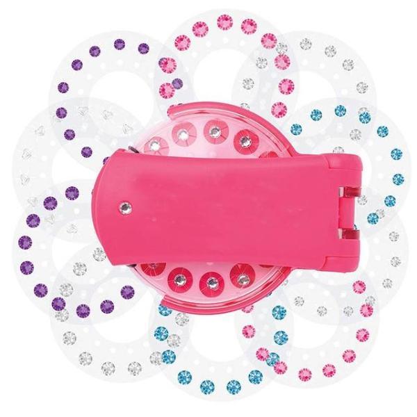Pink nail rig toy with diamond stickers for girls' playhouse activities.