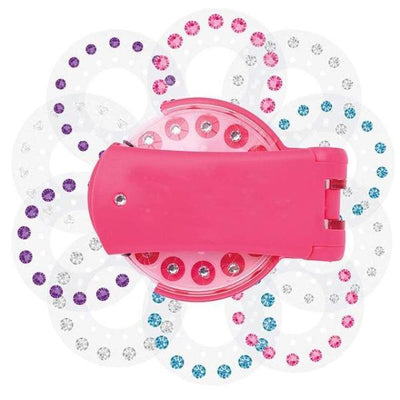 Pink nail rig toy with diamond stickers for girls' playhouse activities.