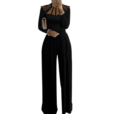 Elegant black women's wide leg jumpsuit in milk silk fabric with long sleeves and lace stitching accents
