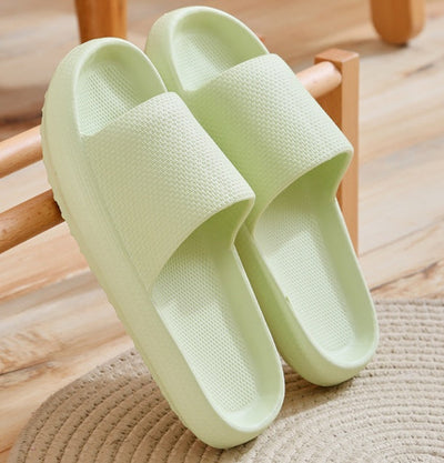 Home bathroom sandals for couples, light green, thick sole design, suitable for hardwood floors.