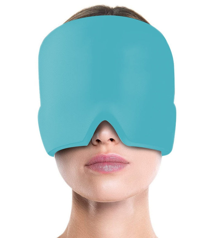 Cold compress eye mask in blue worn by a woman.