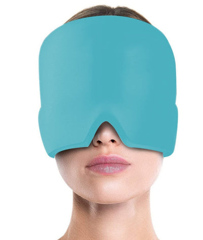 Cold compress eye mask in blue worn by a woman.