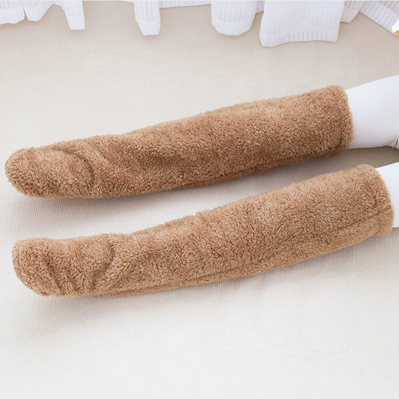 Over knee high fuzzy socks in brown, designed for warmth and comfort, suitable for all seasons.