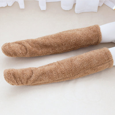 Over knee high fuzzy socks in brown, designed for warmth and comfort, suitable for all seasons.