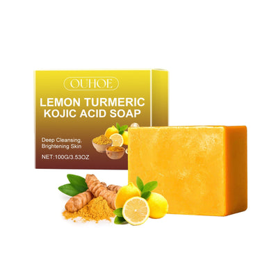 Lemon Turmeric Kojic Acid Soap bar with lemon and turmeric extracts for deep cleansing and brightening skin next to branded packaging box