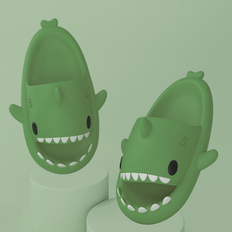 Green adult's slippers designed as funny shark cartoon with comfortable EVA material and anti-skid soles for indoor and outdoor use