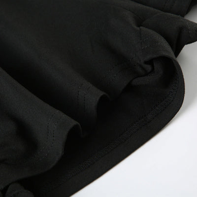 Close-up of black fabric showcasing pleating design detail on women's off-shoulder long sleeve loose jumpsuit